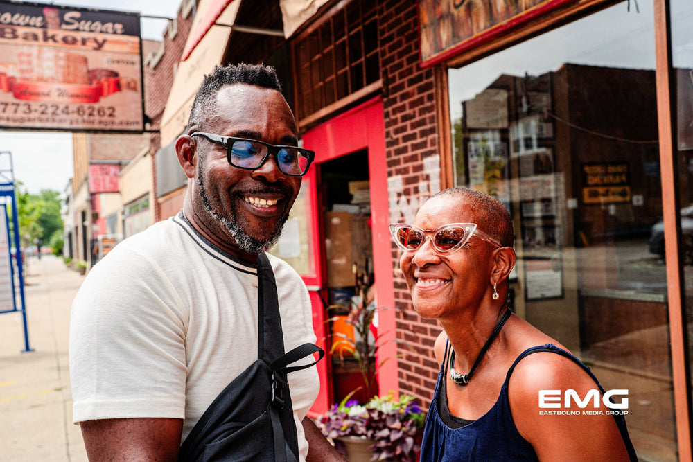 Smiling friends of the bakery outside Brown Sugar Bakery on 75th Street